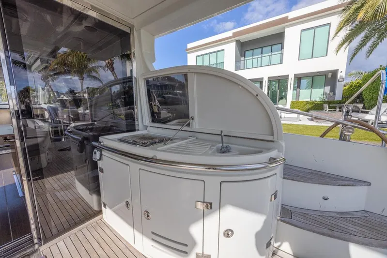  Yacht Photos Pics Outdoor kitchen on 2009 Azimut 68S yacht with modern design and sleek cabinetry.