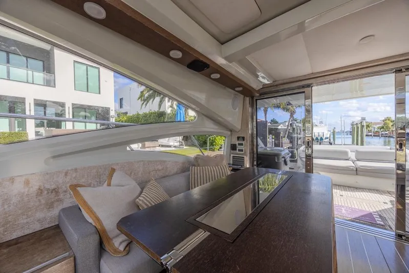  Yacht Photos Pics Interior of 2009 Azimut 68S yacht with modern seating and large windows.