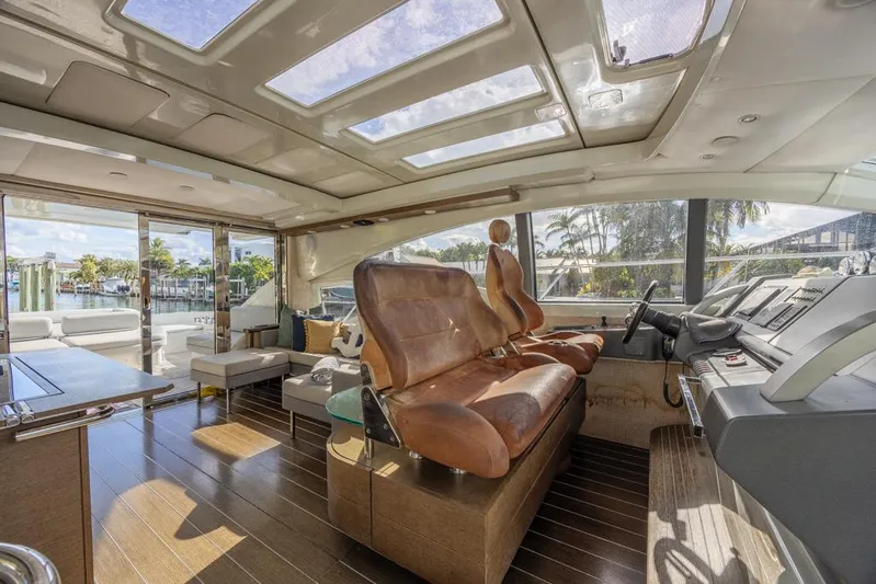  Yacht Photos Pics Luxurious interior of 2009 Azimut 68S yacht with leather seating and panoramic windows.