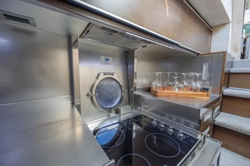  Yacht Photos Pics Modern kitchen in 2009 Azimut 68S yacht with sleek stainless steel appliances.