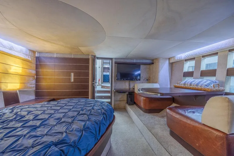  Yacht Photos Pics Luxurious interior of 2009 Azimut 68S yacht with modern furnishings and cozy seating area.