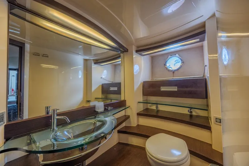  Yacht Photos Pics Luxurious bathroom in 2009 Azimut 68S yacht with modern fixtures and elegant design.