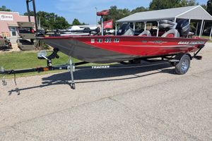 2015 Tracker Pro Team 175 TXW bass boat on trailer, parked outdoors.