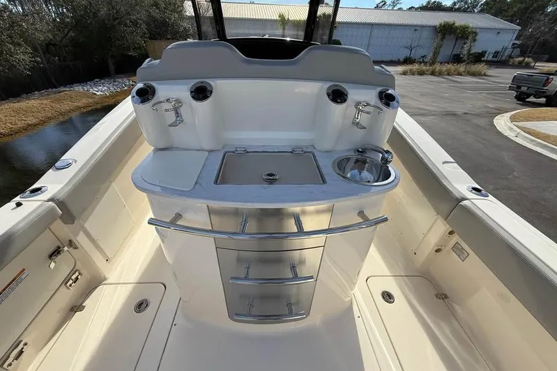  Yacht Photos Pics 2026 Scout 277 LXF boat interior with sink and storage drawers.