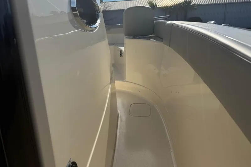  Yacht Photos Pics 2026 Scout 277 LXF boat interior with sleek design and comfortable seating.