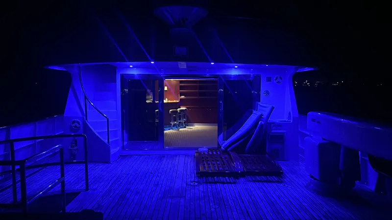 Ligaya Yacht Photos Pics Luxury yacht deck with blue lighting, Ocean Pacifico Diana 2002 model.