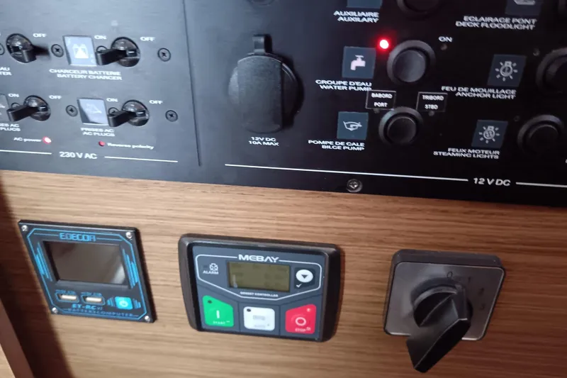  Yacht Photos Pics Control panel of a 2019 Lagoon 42 yacht with various switches and displays.