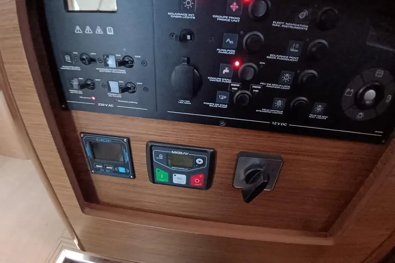  Yacht Photos Pics Control panel of a 2019 Lagoon 42 yacht with various switches and displays.