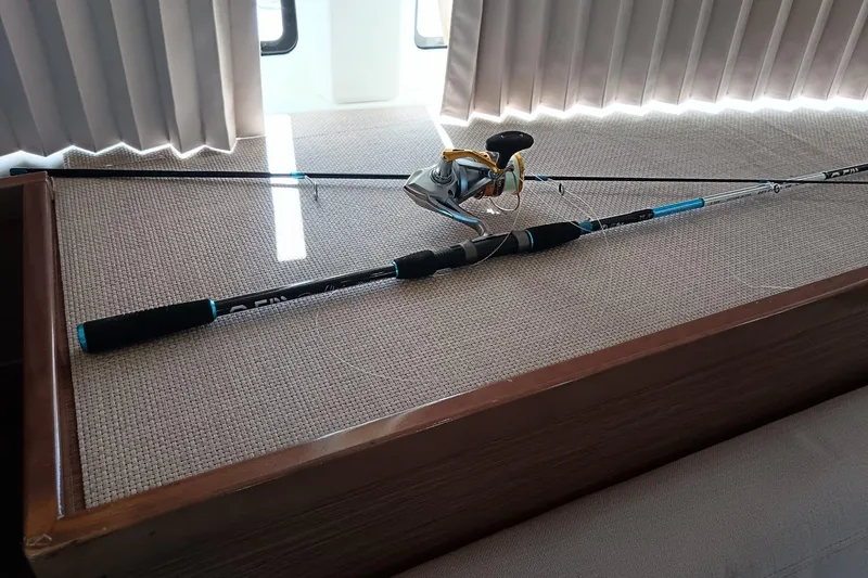  Yacht Photos Pics Fishing rod and reel on a 2019 Lagoon 42 catamaran interior.