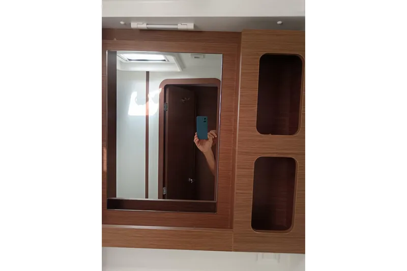  Yacht Photos Pics Mirror and wooden cabinet in 2019 Lagoon 42 yacht interior.