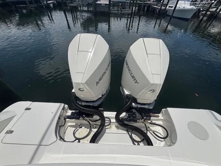  Yacht Photos Pics Twin Mercury outboard engines on a 2019 Boston Whaler 330 Outrage boat.