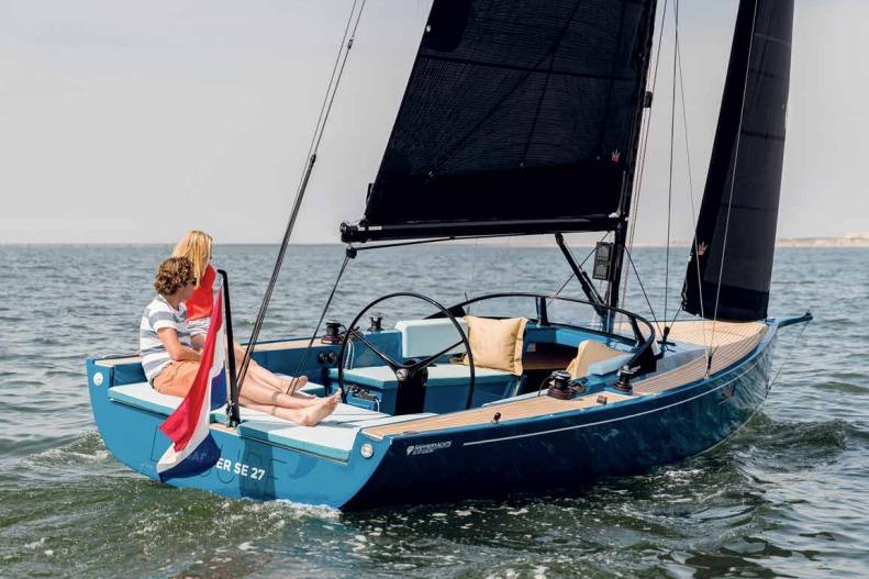 2026 Saffier Se 27 Leisure sailboat cruising on open water with two passengers.