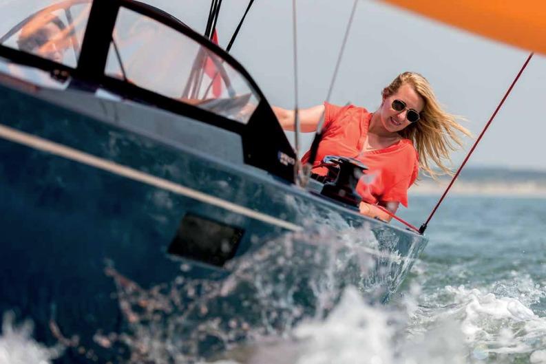 2026 Saffier Se 27 Leisure sailing with a smiling woman on board.