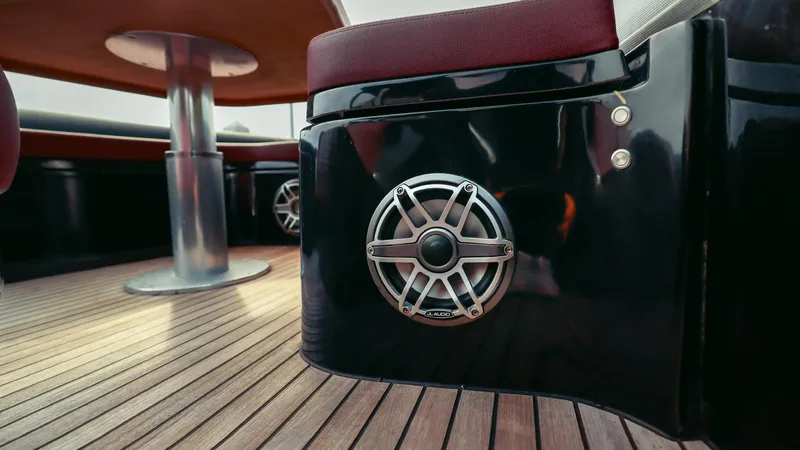 2023 Skipper-bsk 42 Quad 450r Yacht Photos Pics Luxury Skipper-BSK 42 yacht interior with sleek speaker and wooden flooring, 2023 model.