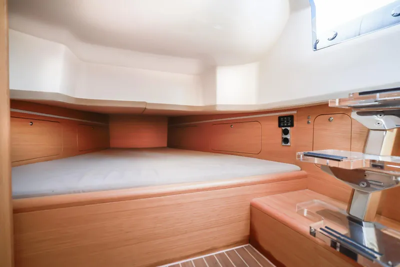 2023 Skipper-bsk 42 Quad 450r Yacht Photos Pics Cozy cabin interior of 2023 Skipper-BSK 42 yacht with wooden finish and modern design.