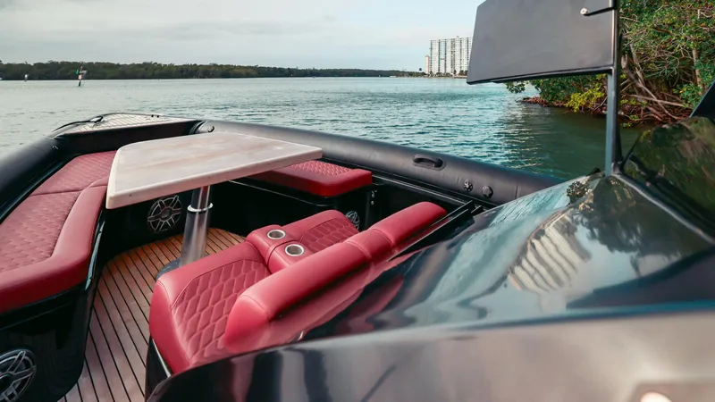 2023 Skipper-bsk 42 Quad 450r Yacht Photos Pics Luxurious 2023 Skipper-BSK 42 boat interior with red seating and scenic water view.