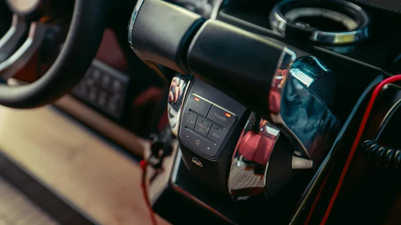 2023 Skipper-bsk 42 Quad 450r Yacht Photos Pics Close-up of Skipper-BSK 42 boat controls, showcasing modern design and functionality, 2023 model.