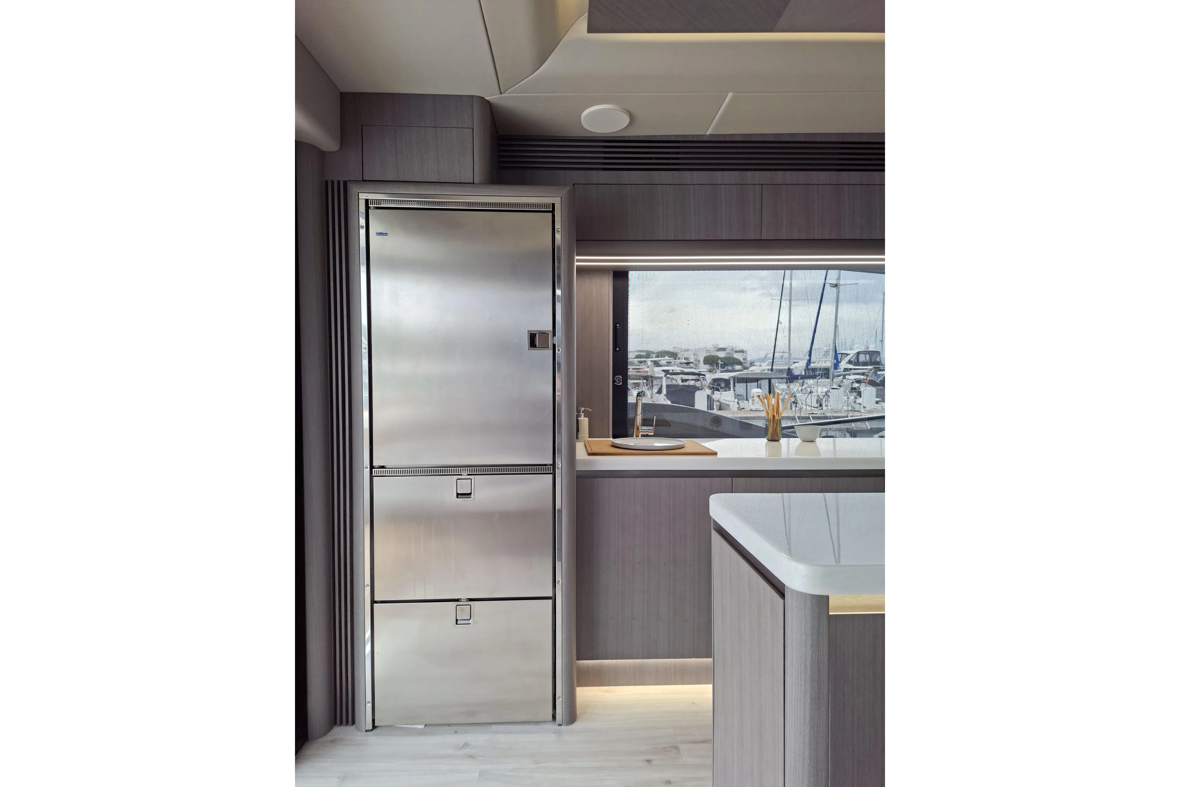  Yacht Photos Pics Modern kitchen interior of 2026 Galeon 560 Fly yacht with stainless steel appliances.
