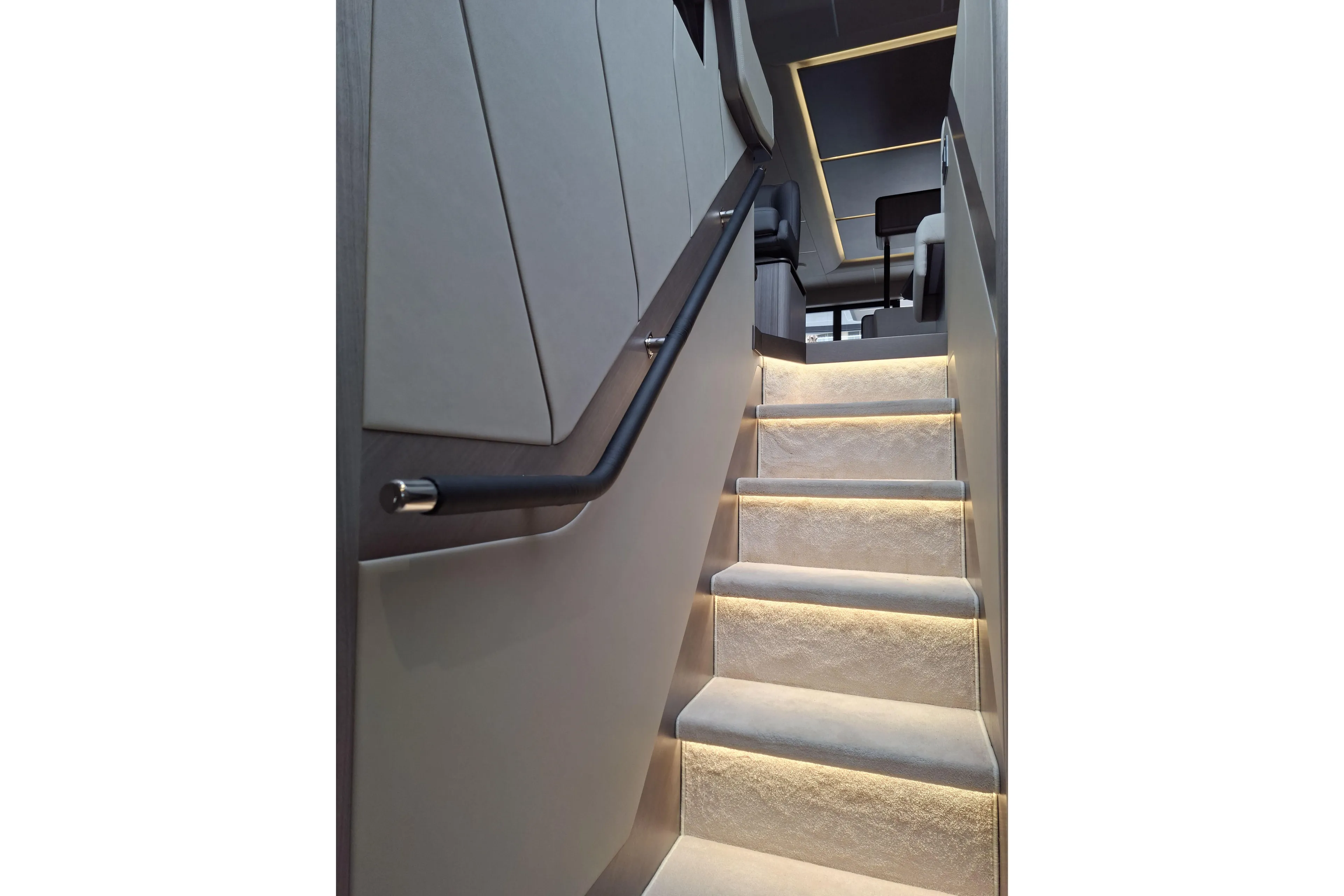  Yacht Photos Pics Modern staircase with ambient lighting inside 2026 Galeon 560 Fly yacht.