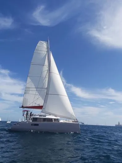  Yacht Photos Pics Sailing yacht NEEL 51, 2017 model, cruising on open sea under clear blue sky.