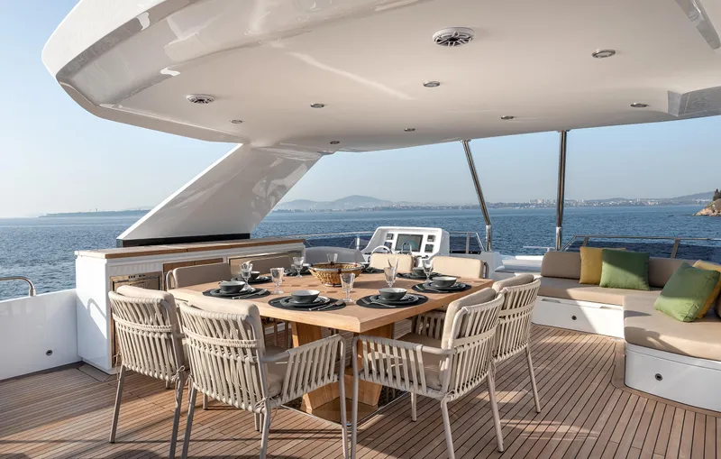 Numarine 22xp Hull #7 Yacht Photos Pics Luxury dining area on 2025 Numarine 22XP yacht with ocean view.