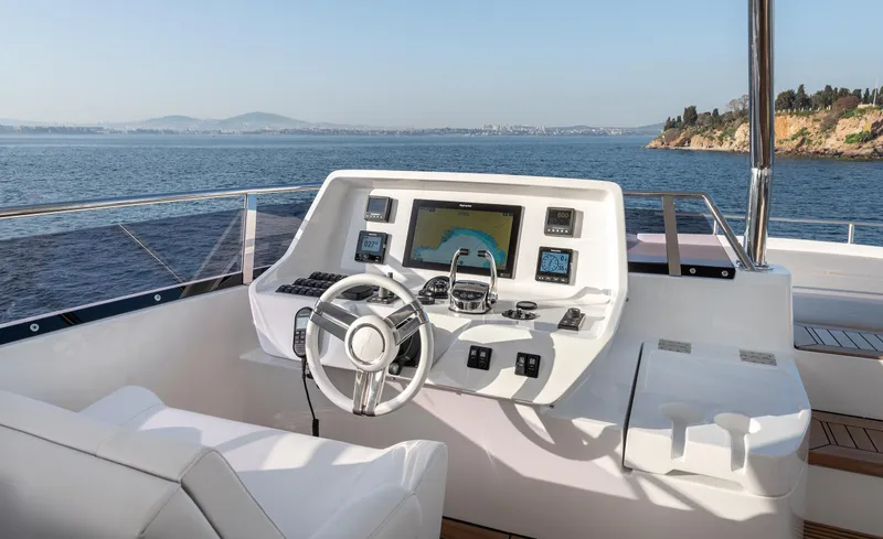 Numarine 22xp Hull #7 Yacht Photos Pics 2025 Numarine 22XP yacht helm with ocean view, featuring modern navigation equipment.
