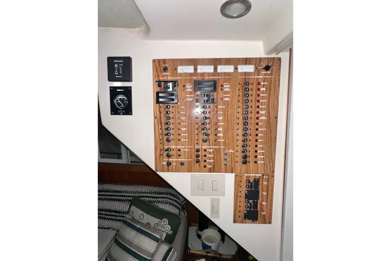 Ohana Yacht Photos Pics Electrical panel of a 1999 Mainship 390 Trawler with switches and gauges.