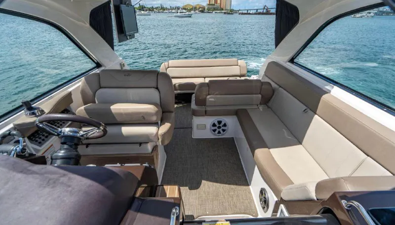  Yacht Photos Pics 2015 Regal 35 Sport Coupe interior with luxurious seating and scenic water view.