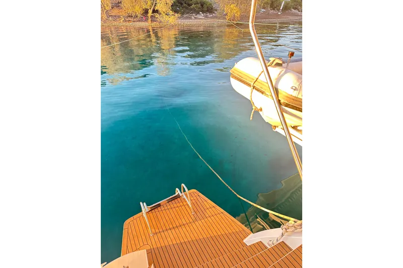 Chicago Yacht Photos Pics Lagoon 52 F yacht deck with clear blue water and inflatable boat, 2020 model.