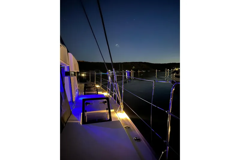 Chicago Yacht Photos Pics Night view of 2020 Lagoon 52 F yacht deck with ambient lighting.