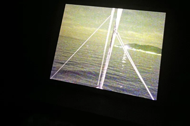 Chicago Yacht Photos Pics Nighttime view from Lagoon 52 F yacht, 2020 model, showing ocean and distant shoreline.