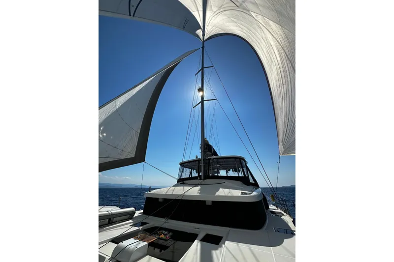 Chicago Yacht Photos Pics Lagoon 52 F 2020 sailing yacht with open sails under clear blue sky.