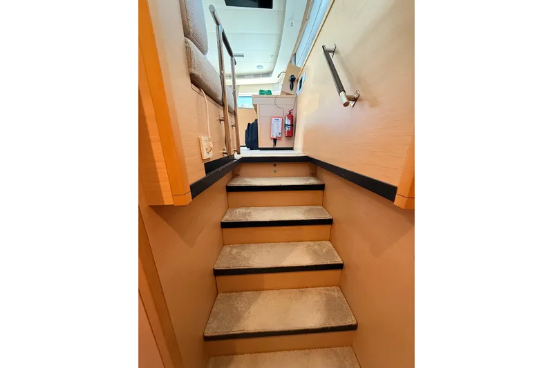 Chicago Yacht Photos Pics Interior stairs of 2020 Lagoon 52 F yacht, featuring modern design and safety railings.