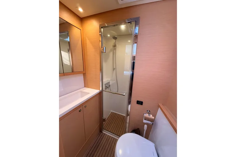 Chicago Yacht Photos Pics Modern bathroom interior on 2020 Lagoon 52 F yacht, featuring shower and vanity.