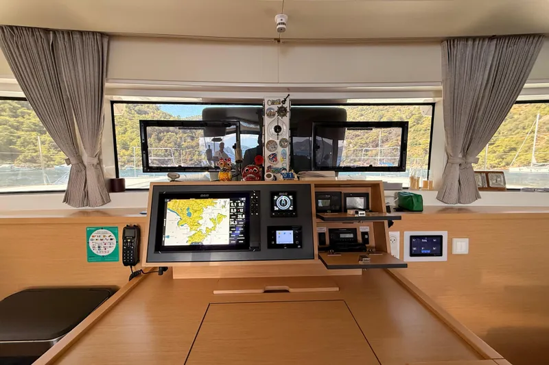 Chicago Yacht Photos Pics Interior of 2020 Lagoon 52 F yacht with navigation equipment and scenic window view.