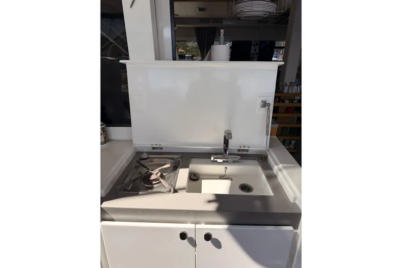 Chicago Yacht Photos Pics Outdoor kitchen on 2020 Lagoon 52 F yacht with sink and stove.