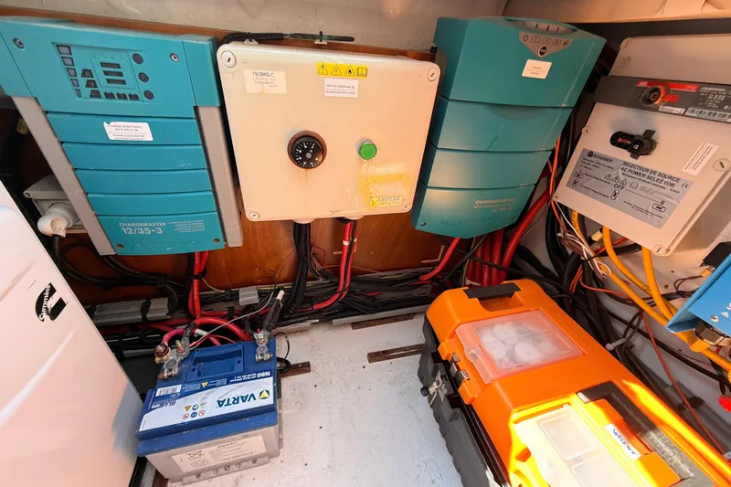 Chicago Yacht Photos Pics Electrical system components inside a 2020 Lagoon 52 F yacht, featuring chargers and wiring.