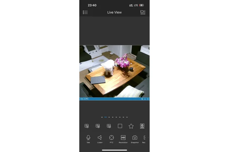 Chicago Yacht Photos Pics Interior view of Lagoon 52 F yacht, featuring a table with flowers and a tablet.