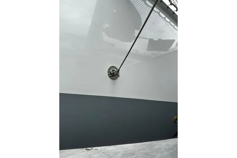 Chicago Yacht Photos Pics Side view of a 2020 Lagoon 52 F catamaran hull with visible fittings.