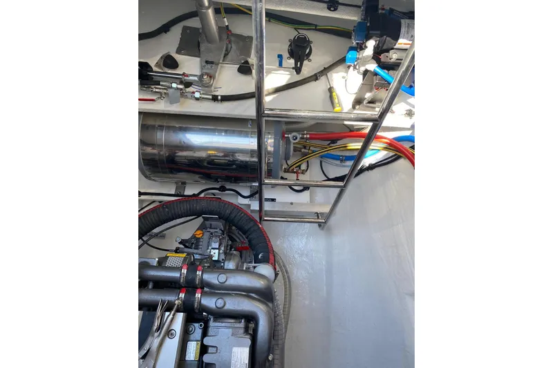 Chicago Yacht Photos Pics Engine room of 2020 Lagoon 52 F yacht with visible machinery and wiring.