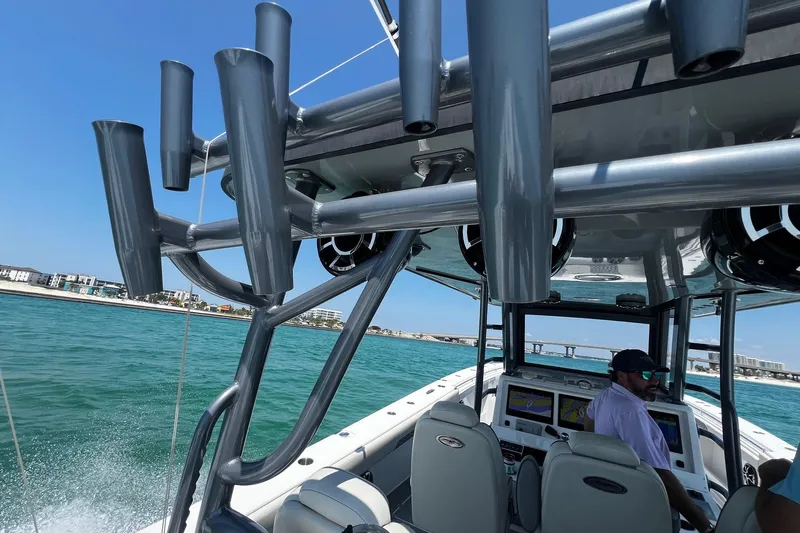 Reel Deployment Yacht Photos Pics 2022 Invincible 46 Catamaran cruising on clear waters, featuring advanced navigation systems.