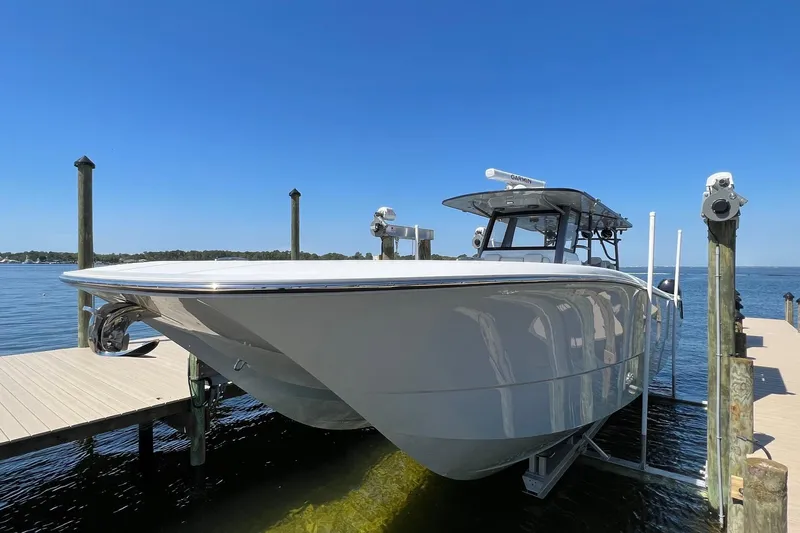 Reel Deployment Yacht Photos Pics 2022 Invincible 46 Catamaran docked, showcasing sleek design and advanced features.