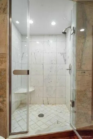 Desperado Yacht Photos Pics Luxurious tiled shower in 2008 Hatteras 77 Enclosed Bridge yacht.