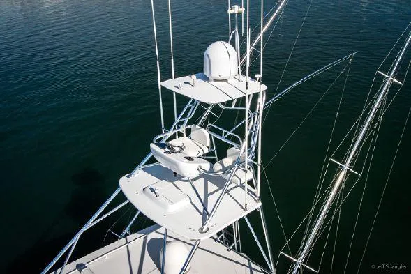 Desperado Yacht Photos Pics Aerial view of 2008 Hatteras 77 Enclosed Bridge yacht's upper helm station.