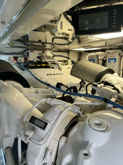 Desperado Yacht Photos Pics Engine room of a 2008 Hatteras 77 Enclosed Bridge yacht.