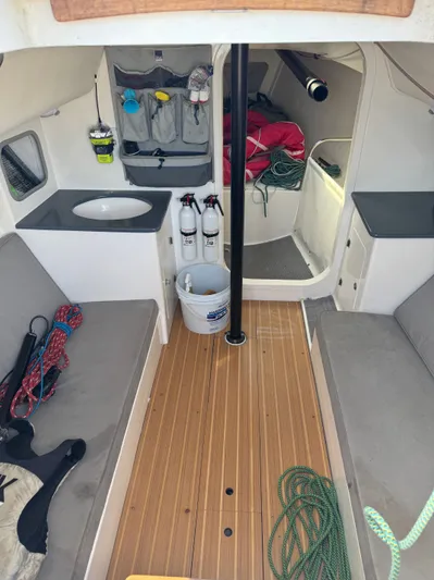 Easy Yacht Photos Pics Interior of a 2014 J Boats J/88 yacht with wooden flooring.