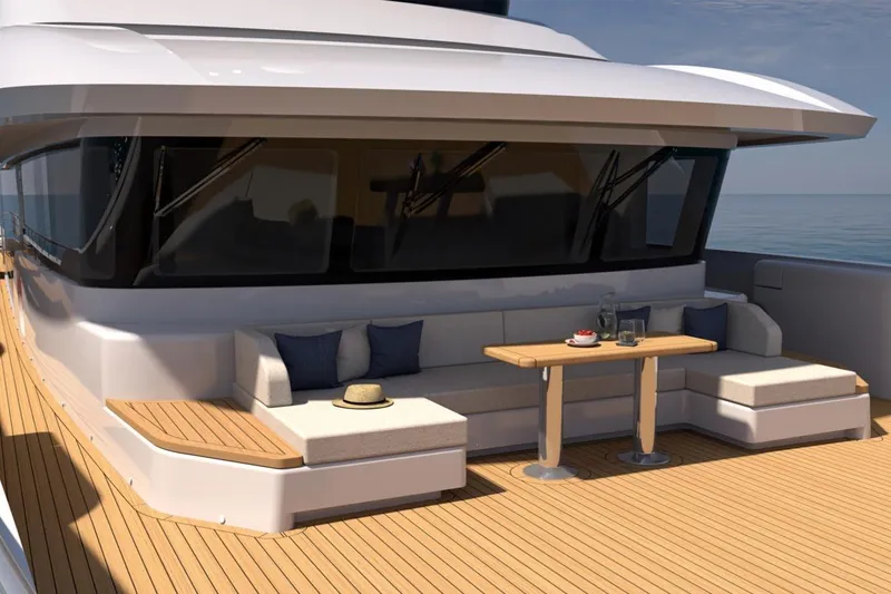 Presence Yacht Photos Pics Luxury yacht deck with seating area, table, and ocean view, Cantiere Delle Marche 130.37, 2026 model.