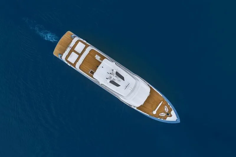 Presence Yacht Photos Pics Aerial view of 2026 Cantiere Delle Marche 130.37 yacht cruising in deep blue sea.