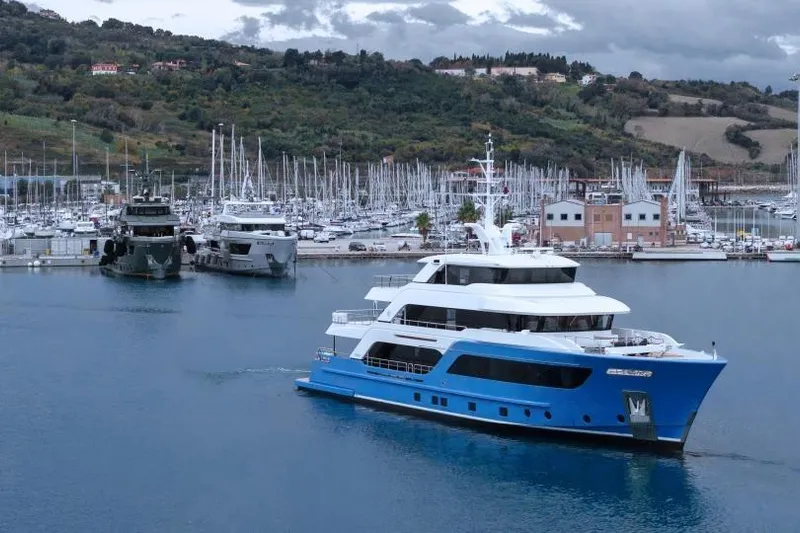 Presence Yacht Photos Pics Luxury yacht Cantiere Delle Marche 130.37, 2026 model, cruising near a marina.