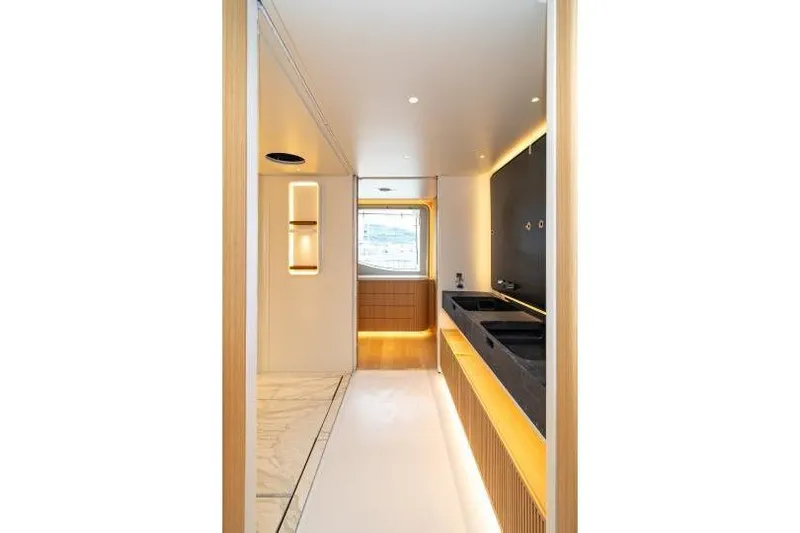 Presence Yacht Photos Pics Modern interior of 2026 Cantiere Delle Marche 130.37 yacht with sleek design and ambient lighting.